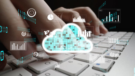 Hands typing on a keyboard with a visual cloud overlay, depicting digital data analysis, cyber...