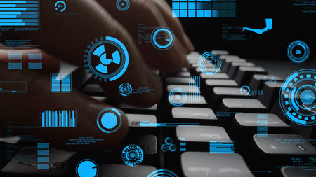 Close-up of hands typing on a keyboard, surrounded by blue futuristic digital elements showing data...