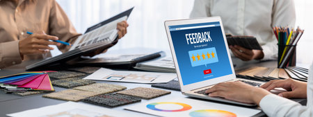 Group of interior architect designer team at table choosing color samples with architecture software on laptop screen. Modern house renovation and interior color selection design concept. Insightの写真素材