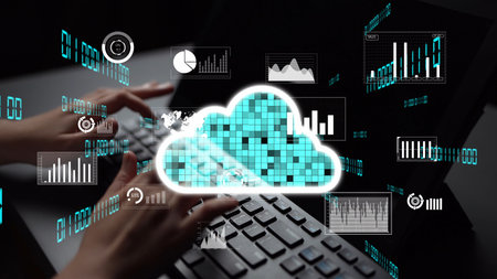 A person typing on a keyboard with cloud computing graphics and data analytics overlays, symbolizing...
