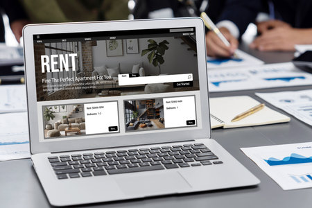 Online real estate rental search brisk on computer. House home or apartment rental website online.の素材