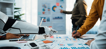 A futuristic workspace showcasing a robot hand assisting in collaborative data analysis....