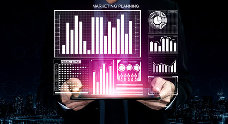 A businessman analyzes marketing data on a tablet, surrounded by graphs and charts. This image represents strategic planning and informed decision-making in business. Imputeの写真素材