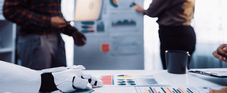 At a modern workspace, analysts and consultants pair advanced analytics with collaboration, formulating targeted marketing strategies that drive growth.の写真素材