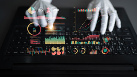 A creative visualization of hands interacting with digital charts on a laptop, showcasing advanced...