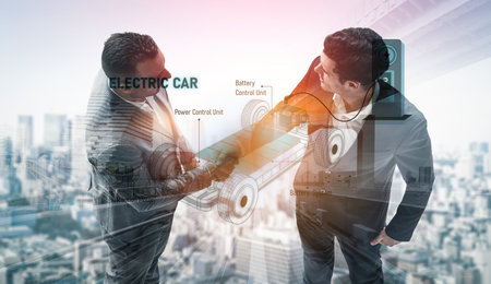 Structure of electric car showing battery system, traction motor, control units, and charging station for understanding EV functionality and energy flowの写真素材