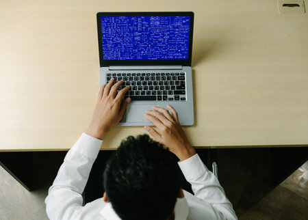 Mathematic equations and modish formula on computer screen showing concept of science and education
