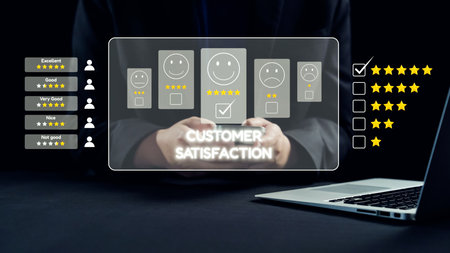 A business professional analyzes customer satisfaction using digital feedback tools, showcasing smiley icons and ratings on a laptop, emphasizing modern evaluation methods.の写真素材