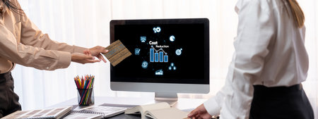 Cost reduction, cost saving concept shown on computer screen brisk, corporate business efficiently...
