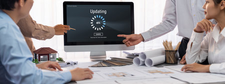 Group of interior architect designer discussing together on blueprint and laptop screen display architecture software for more precise designing layout. Modern home design and renovation. Insightの写真素材