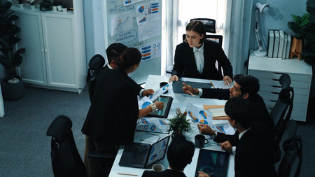 Top view of investor handed financial document to manager while explain marketing idea at meeting...