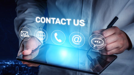 UI concept for contact us section showing icons for email, web, phone, and message. Contact and support icons help streamline business communication and improve customer contact experience. Muxerの写真素材