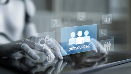 AI helps optimize outsourcing strategy by matching the right global workforce to specific tasks and analyzing productivity across external teamsの写真素材