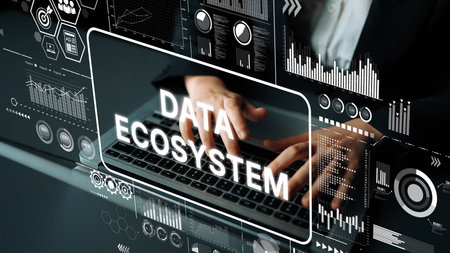 Business Professional Engaging with Data Ecosystem Graphical Interface on Laptop at Modern Workspace. Asymptotic smart data analytic.の写真素材