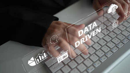 Data-driven decision-making empowers business through analytics, data collection, and AI systems. Data driven tools support cloud data processing and data visualization across platforms.の写真素材