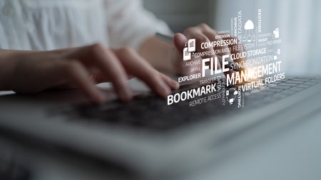 A modern laptop in a stylish office setting showcasing digital file management concepts, emphasizing...