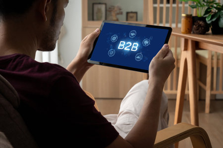 Business person navigates B2B landscape, harness technology to enhance business-to-business...