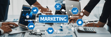 A modern office scene showcasing collaborative marketing strategies, emphasizing branding and consumer engagement through active discussions and digital presentations.の写真素材