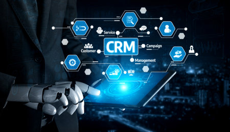 A robot hand interacts with a sleek digital interface showcasing CRM solutions for customer management and engagement, emphasizing innovation and business strategies. Tesselの写真素材