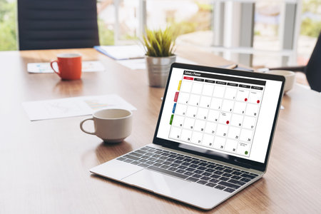 Calendar on computer software application for modish schedule planning for personal organizer and online businessの写真素材