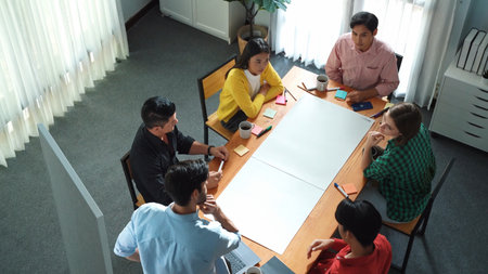 Top view of skilled manager discussing and explain strategy at meeting. Professional smart...