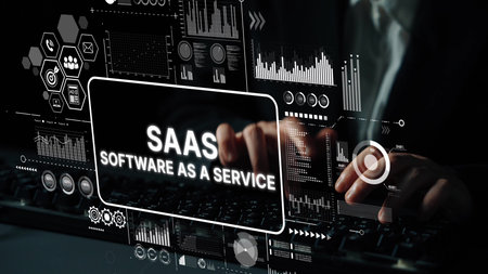 Businessman Using Innovative Software as a Service Technology at Work with Data Visualization and Analytics in Background. Asymptotic smart data analytic.の写真素材