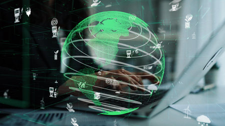 A creative representation of a green globe highlighting sustainability concepts in a modern workspace, showcasing the fusion of technology and environmental awareness. Xenicの写真素材