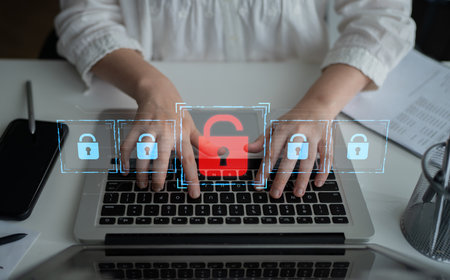 Digital security concept illustrating a cybersecurity breach, with a red unlocked padlock indicating...