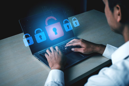 Digital security concept illustrating a cybersecurity breach, with a red unlocked padlock indicating...