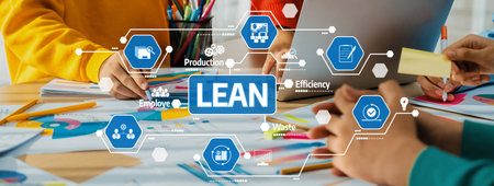 Engaging scene of a collaborative workspace showcasing the Lean methodology through visual aids, highlighting efficiency and employee involvement in business processes. Amityの写真素材