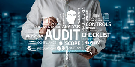 A business professional holds a tablet displaying key audit concepts, emphasizing financial analysis, compliance, and efficiency in a modern urban setting. Tesselの写真素材