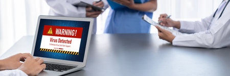 Virus warning alert on computer screen detected brisk cyber threat , hacker, computer virus and...