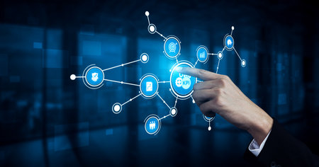 A business professional interacts with digital KPI metrics in a modern office. The image illustrates...