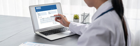 Invoice on computer screen from accounting application. Computer program for financial and budget of...