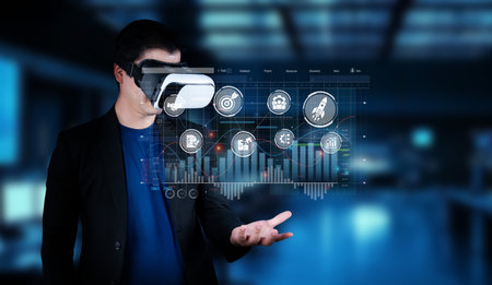 A business professional engages with advanced virtual reality technology to analyze data and develop...