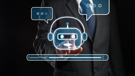 A businessman interacts with a virtual AI chatbot graphic, illustrating command prompt engineering...