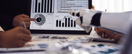A dynamic business meeting showcasing data visualization with a human and robot collaboration,...