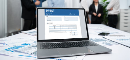 Invoice on computer screen from accounting application. Computer program for financial and budget of...