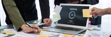 Analyst team use sticky note for creative and analytic brainstorm for business idea with BI data dashboard on laptop screen. Analysis financial data visualization tech for marketing strategy.の写真素材