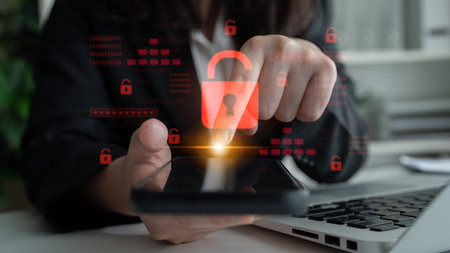 Digital security concept illustrating a cybersecurity breach, with a red unlocked padlock indicating...