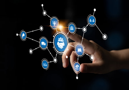 A close-up view of a hand interacting with a digital network interface, showcasing interconnected...