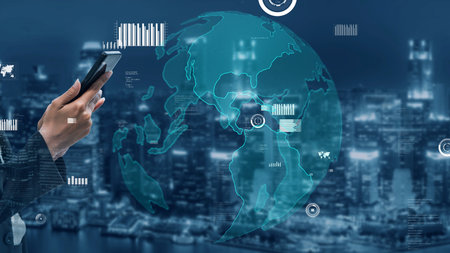 A visually striking image showcasing a smartphone in hand with a digital globe overlay, illustrating...