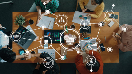 Collaborative Business Meeting with Data Flow and ERP System Visualization in Modern Office...