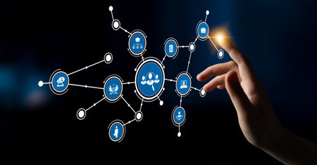 A hand reaching toward a digital interface illustrates the concept of connectivity and technology,...