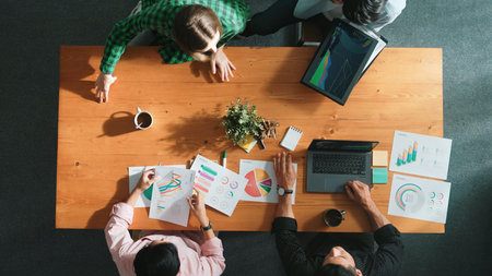 Top view of business team attend meeting while prepare working and analyzing data. Group of diverse...