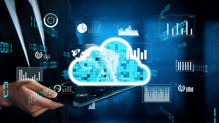 A businessman interacts with a tablet displaying dynamic cloud computing technology, focusing on...