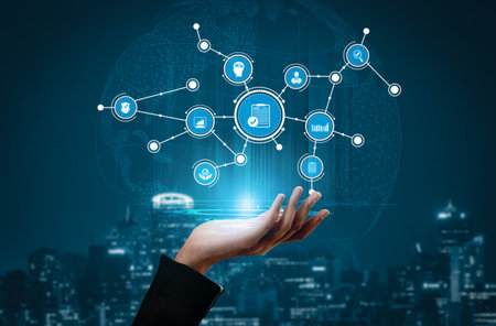 A futuristic hand holding digital icons symbolizing connectivity, data, and technology above a...