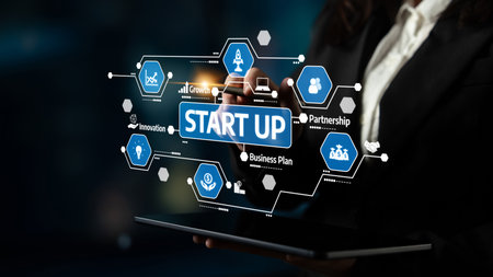 A business professional interacts with a digital interface showcasing startup strategies, focusing...