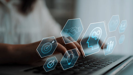 Head with gear and icons representing learning, digital training, and development process, showing...
