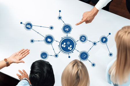 A dynamic and engaging business meeting featuring digital data visualization. Participants interact...